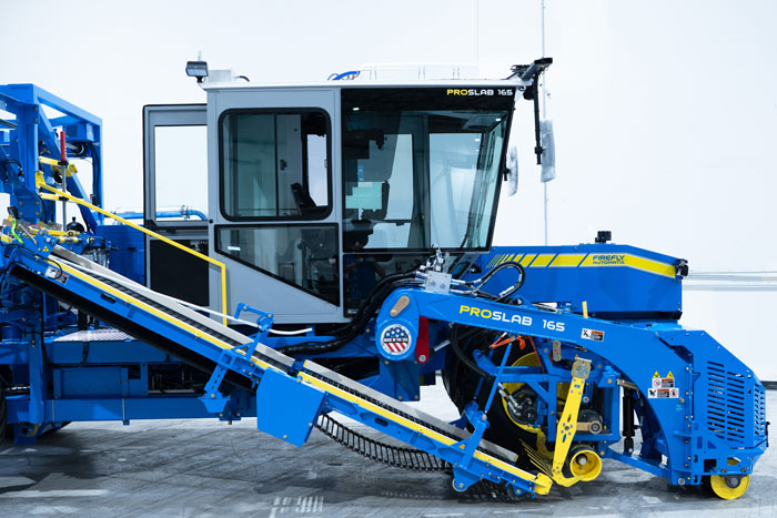 gray cab, conveyor, and head boom of ProSlab 165 sod harvester